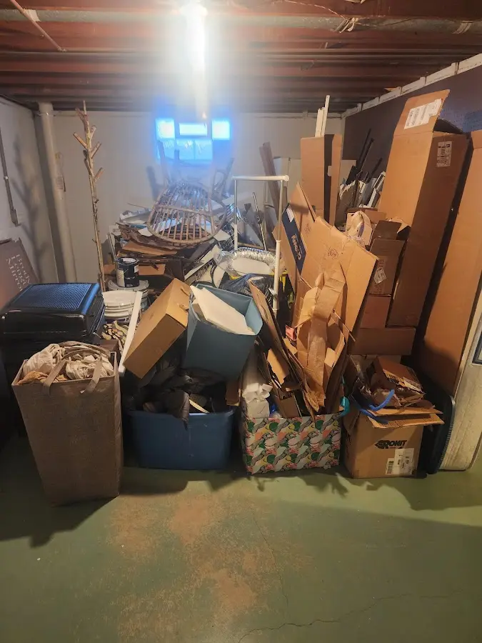 Roll-off dumpster container at job site for 15 Yard Dumpster Rental in Pine Hills